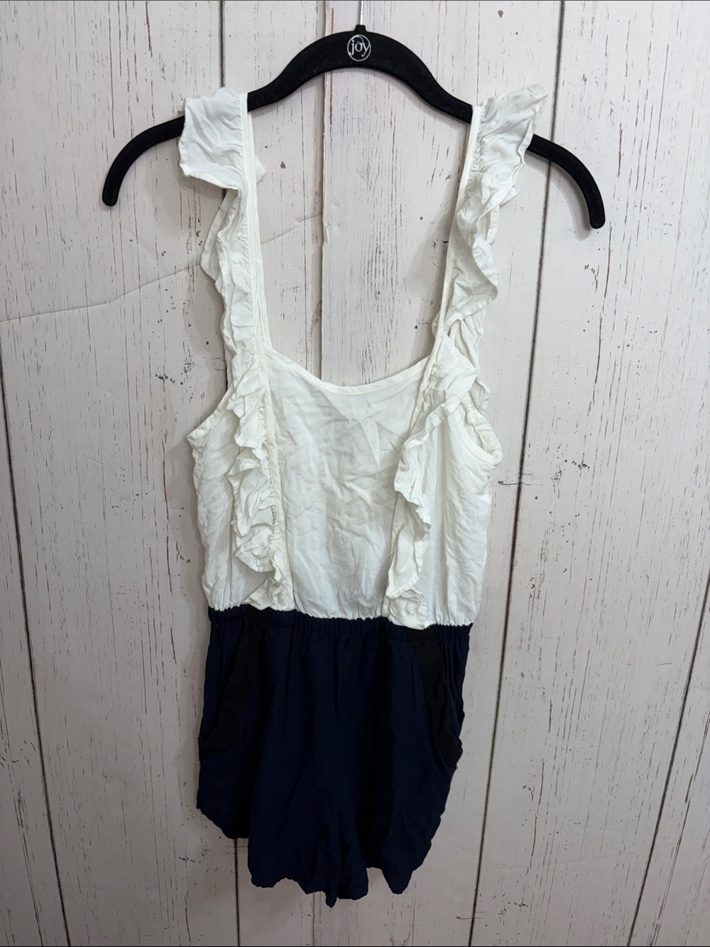 Anthropologie White and Navy Ruffled Sleeveless Romper